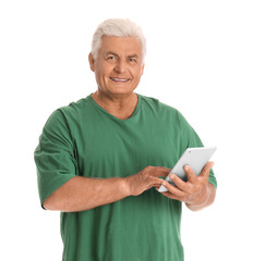 Senior man using tablet computer on white background
