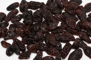 dried raisins on isolated background