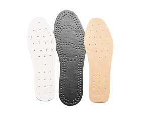 Different orthopedic insoles isolated on white background