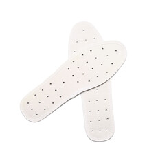 Pair of orthopedic insoles on white background