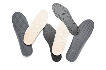 Set of different orthopedic insoles isolated on white background