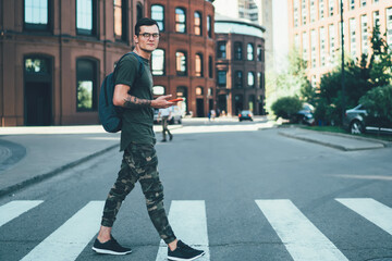 looking at camera while installing application for ofline communication on smartphone device