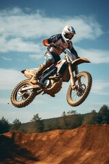 A rider performing an impressive jump on a motocross bike. a professional rider who rides a motorcycle and runs hard off-road. generative AI
