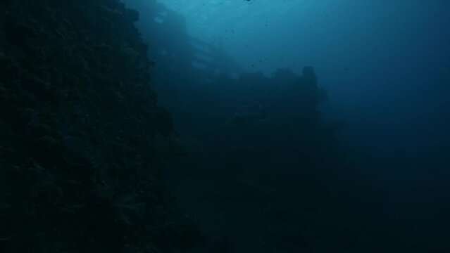 USAT Liberty Shipwreck closeup, underwater super slow mo
