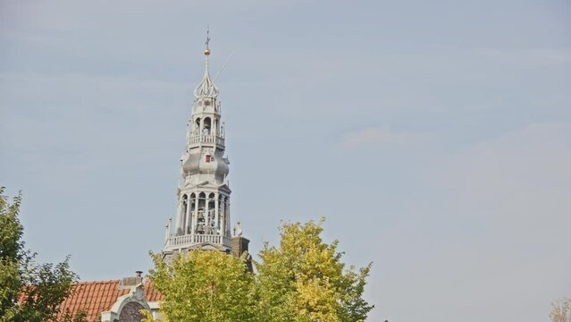 Tilt down from the Old Church Tower in Amsterdam towards a beautiful canal