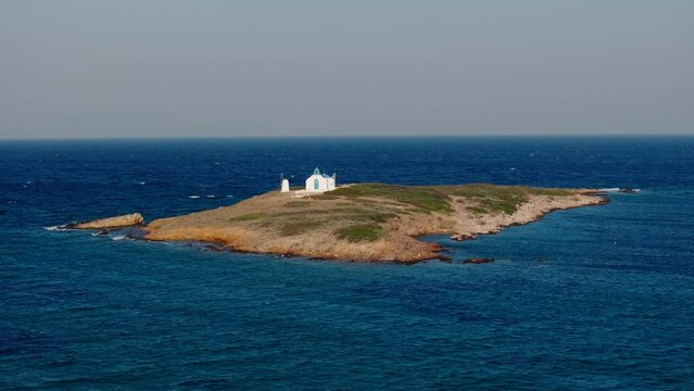 Small orthodox church on a small island in Vravrona, Greece