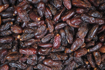  many date fruits display for sale at local market 