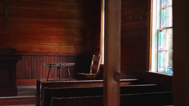 A church with wooden pews and a pulpit