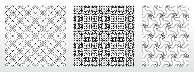 Geometric floral set of seamless patterns. White and black vector backgrounds. Damask graphic ornaments.