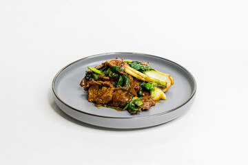 roasted on wok oyster beef with vegetables in sause