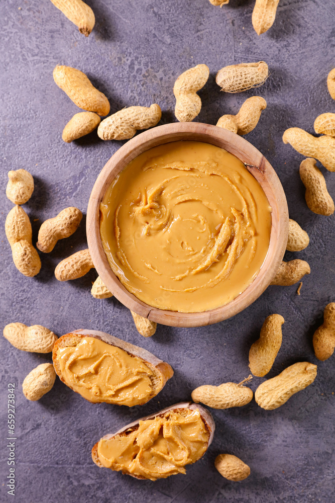 Wall mural peanut butter in bowl with peanut ingredient