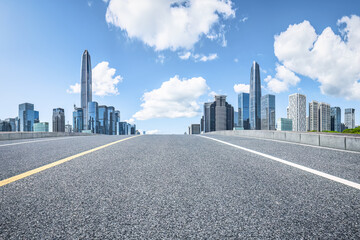 Fototapeta na wymiar Shenzhen city skyline and asphalt road background