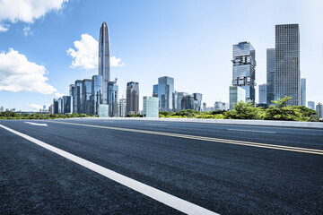 Fototapeta na wymiar Shenzhen city skyline and asphalt road background