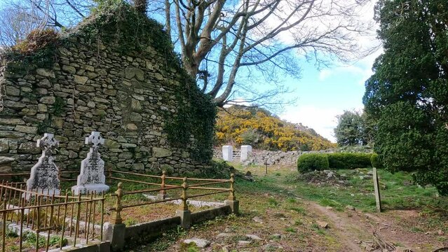 old Irish famine graveyard historic old church and gates to this spiritual place in early spring