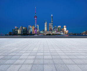 financial district buildings of shanghai and empty floor at night	
