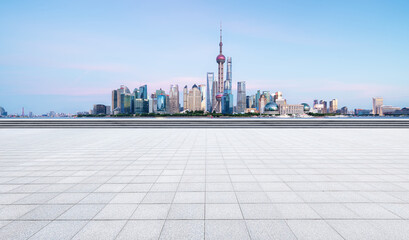 Fototapeta na wymiar financial district buildings of shanghai and empty floor in sunny day
