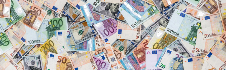 Two leading currencies - dollar and euro bills for desing