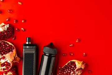 Electronic cigarette with pomegranate flavor on red background