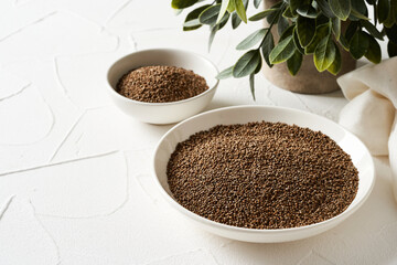 perilla frutescens deulkkae seed on white table background. perilla frutescens deulkkae seed on white table. perilla frutescens deulkkae seed food background