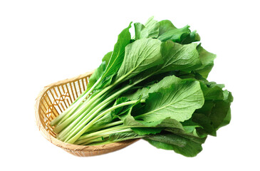 Fresh green leafy  organic vegetables on basket, isolated on white background. Concept, food ingredient, prepare for cooking. Healthy eating with vitamins and fibers food.        