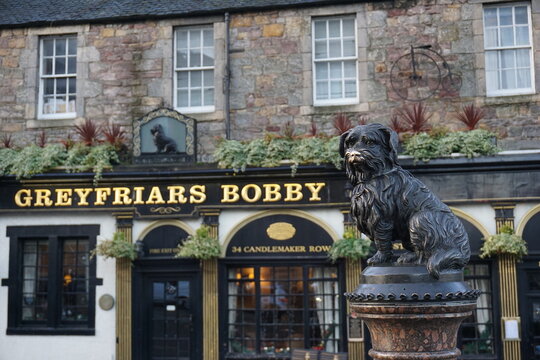 Exterior architecture and detail of 'Greyfriars Bobby monument', a famous Skye Terrier granite fountain, the dog who guarded his masters grave for 14 years- Edinburgh, Scotland