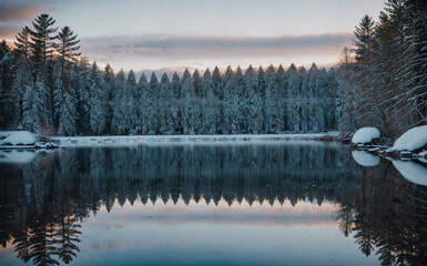 Reflective Lake with Snowy Scenery 
