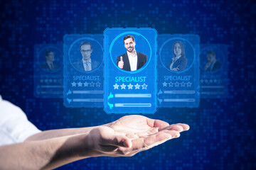 Online recruitment application and one day specialist online search service concept with male hands holding virtual profile cards, containing ratings and candidate photos on blurry blue background.