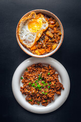 Homemade minced pork stir-fried with soy sauce and fried egg curry