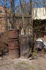 Old rusty containers in a yard