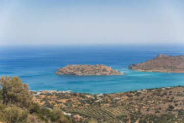 Fototapeta premium aesthetic view of Mirabello Bay view with Spinalonga island on Crete, Greece on a sunny summer day. High quality photo