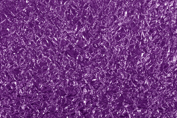 Purple foil shiny texture, abstract wrapping paper for background and design art work.