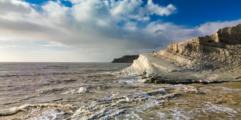 Aerial drone viewpoint on Stair of the Turks. Scala dei Turchi is a rocky cliff on the southern coast of Sicily, Italy