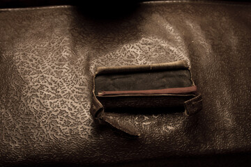 an old worn leather briefcase for documents