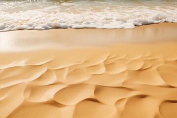 Golden Beach Serenity: Close-Up of Beautiful Beach Sand on a Soft Background of Sea Waves