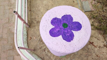 stone fence painted, drawing flower and leaves