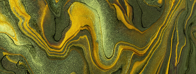 Abstract fluid art background green and golden colors. Liquid marble. Acrylic painting with olive and yellow gradient.