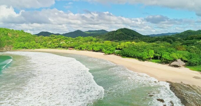 Large waves at empty beach in San Juan del Sur, Nicaragua, travel destination