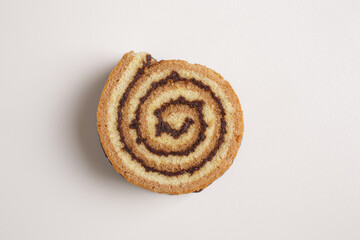 brioche swirl with chocolate on a white background shot from above