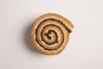 brioche swirl with chocolate on a white background shot from above