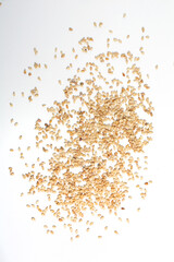 sesame seeds on a white background taken from above
