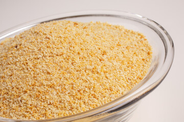 breadcrumbs featured inside glass bowl on white background