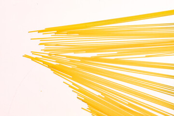 durum wheat spaghetti on a white background seen from above