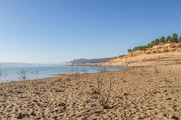 Sunny winter day at the Negratin lake in Andalusia, Spain - obrazy, fototapety, plakaty