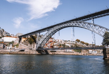 Panoramic view of the Douro River with Dom Luis I Bridge in Porto, Portugal