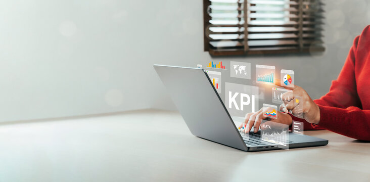 Female analyst uses Work on laptop and dashboard for business analysis, data and data management system with KPIs and indicators connected to database for technology finance. Corporate strategy