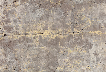 Cracked concrete wall as an abstract background. Texture