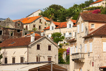 Fototapeta na wymiar Houses of Perast, Montenegro and flowers