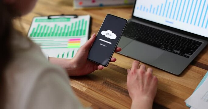 Woman saving information on mobile phone cloud closeup 4k movie. Storing information online concept