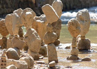 Pyramids of stones on the river