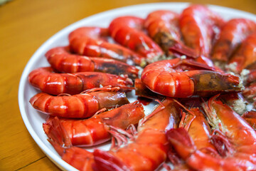 A plate of fresh and delicious boiled prawns